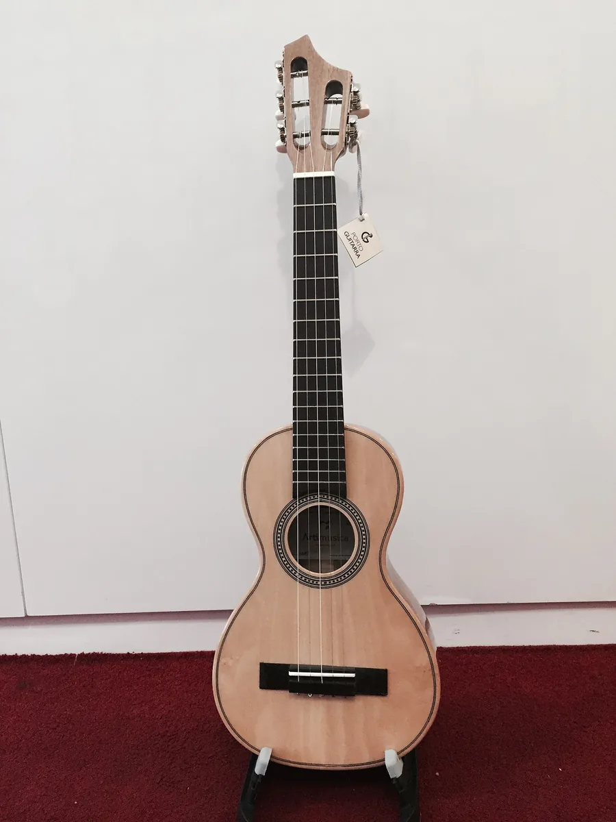 A rajao, a small guitar-like instrument of the type played in Madeira, shown against a plain background